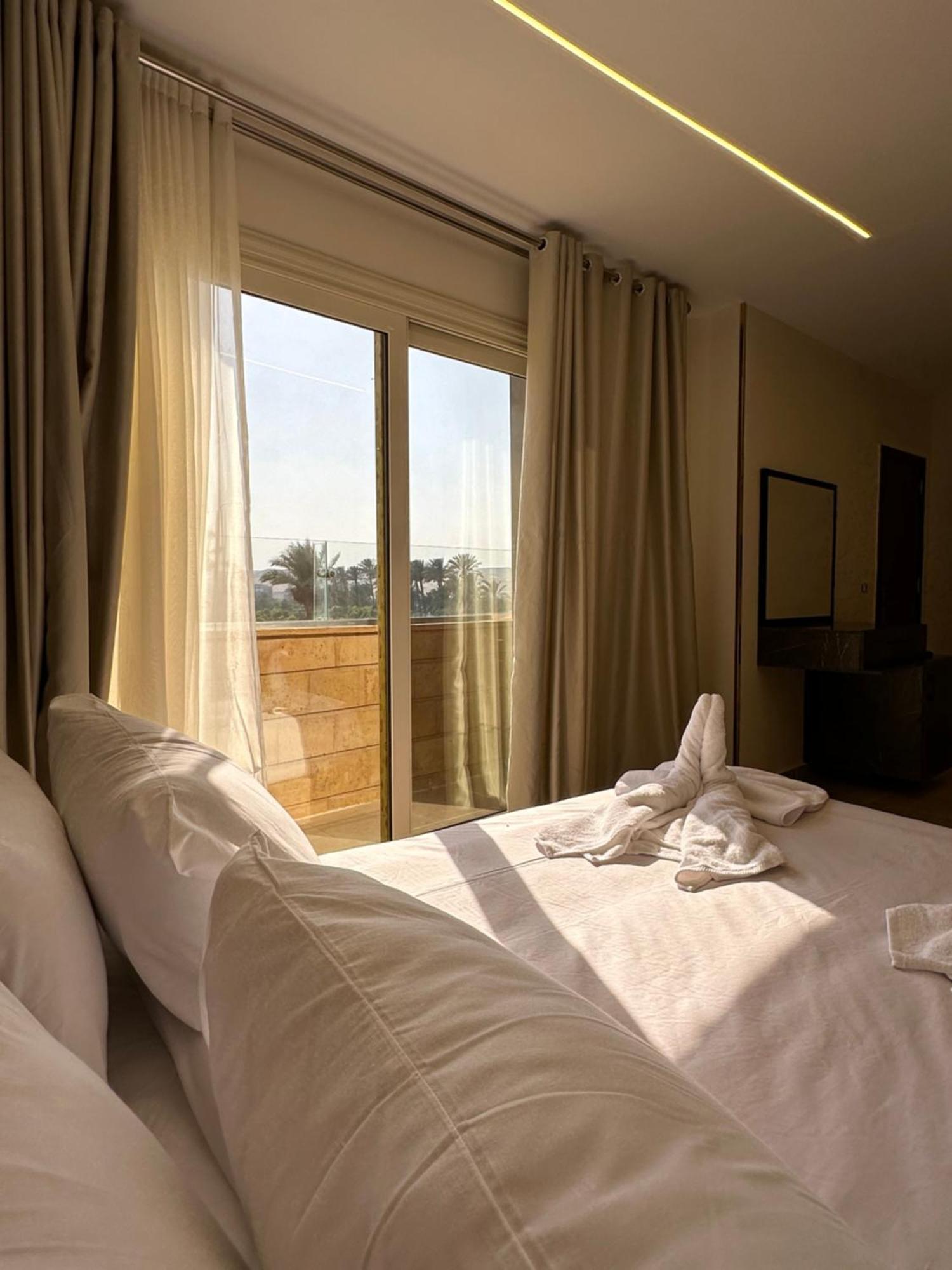 Taj Pyramids View Inn Kafrat al Jabal Bagian luar foto